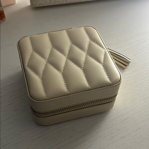 Cream Quilted Cosmetic Bag with Tassel Detail